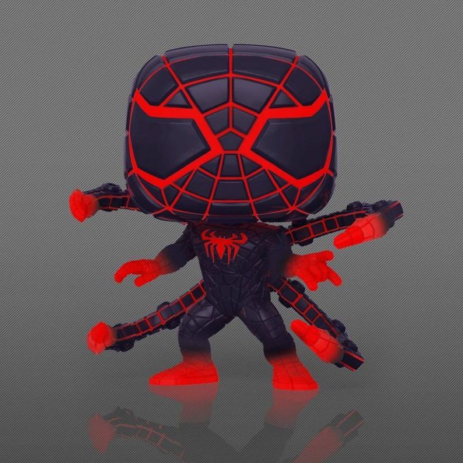 Toy figure with black and red design on a gray background