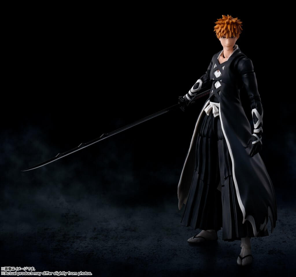 Figure in black and white outfit holding a sword against a dark background