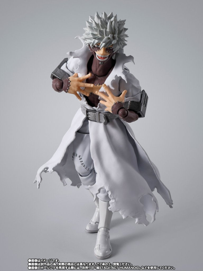 Action figure of a character with white hair and white outfit on a gray background