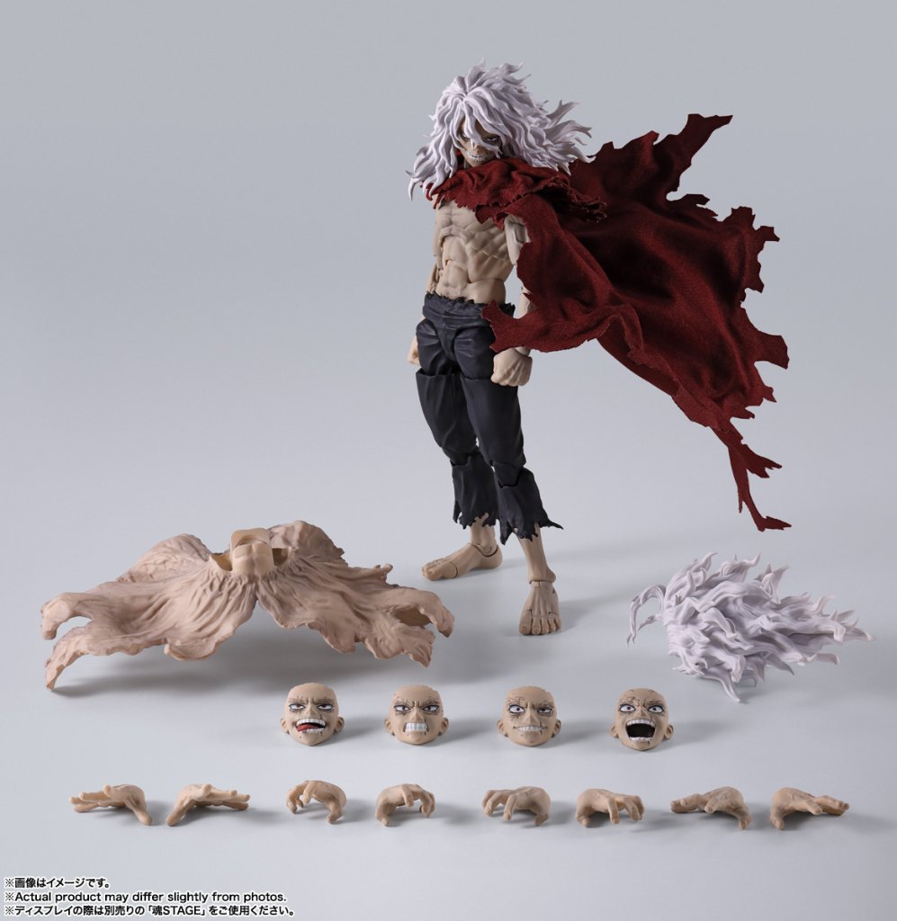 Action figure with interchangeable parts on a gray background